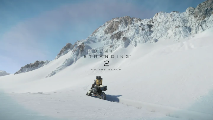 Sam on a motorbike loaded with packages crosses a snowy slope at the foot of a rocky mountain.